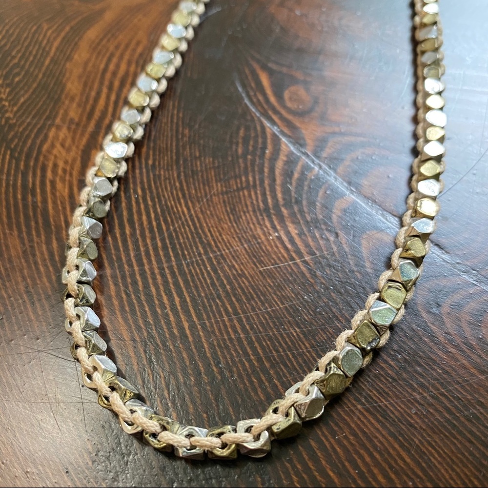 Vintage silver and gold necklace woven on cotton